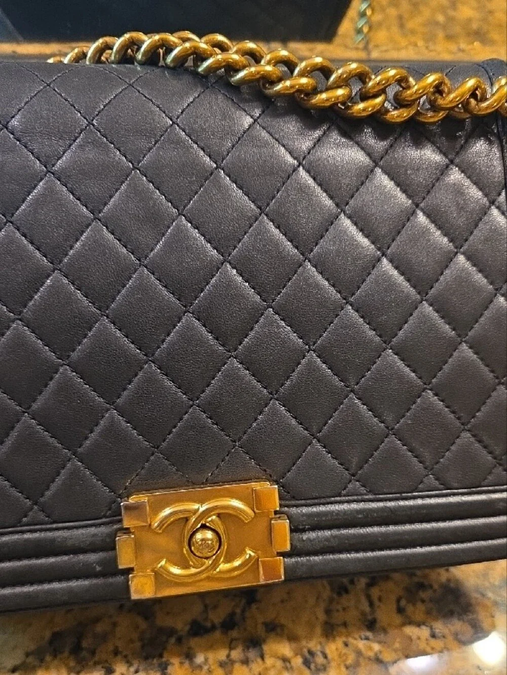 CHANEL Medium Boy Bag Quilted Lambskin Crossbody with Gold Hardware.